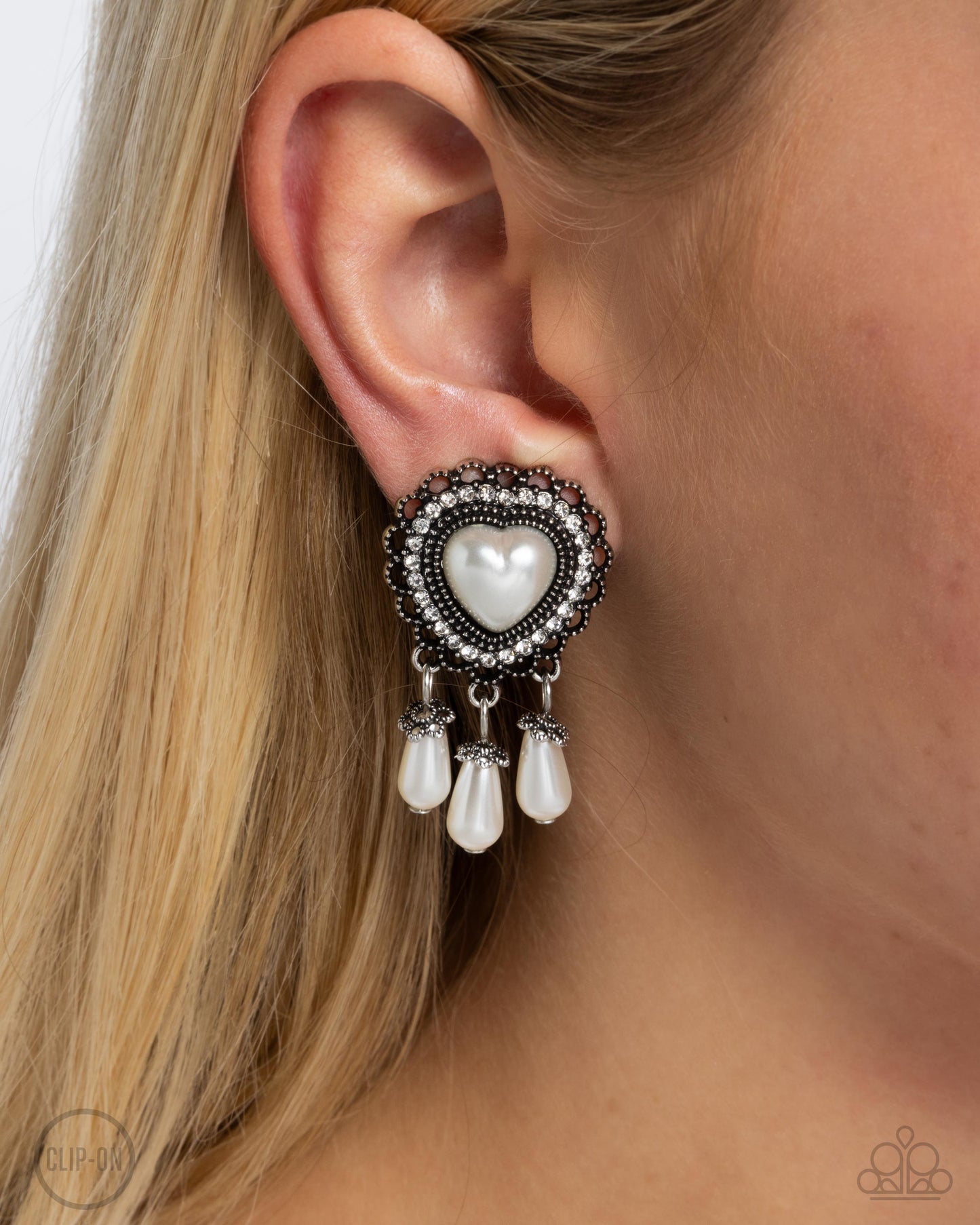 Sumptuous Story - White Clip On Earring